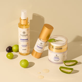 Cosmetic products with green grapes and aloe vera on a beige background