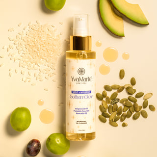 YvaMarie Golden Glow skincare bottle with avocado and seeds on a beige background